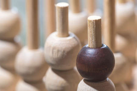 Wooden figures in the concept of individuality and leadershipの写真素材