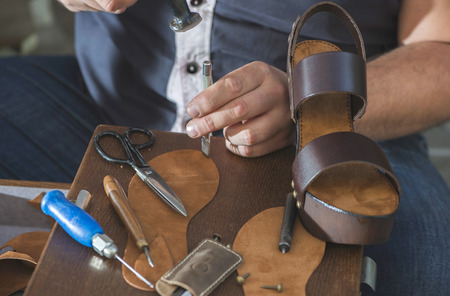 Making shoes manual. Leather sandalsの写真素材