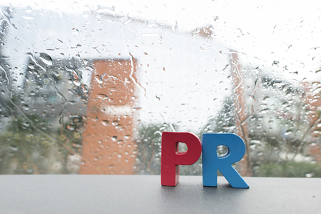 Word PR. Close up wooden letters.の写真素材
