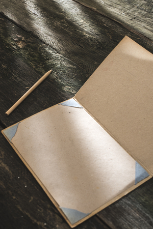 Vintage pencil and drawing paper. Weak sunlightの写真素材