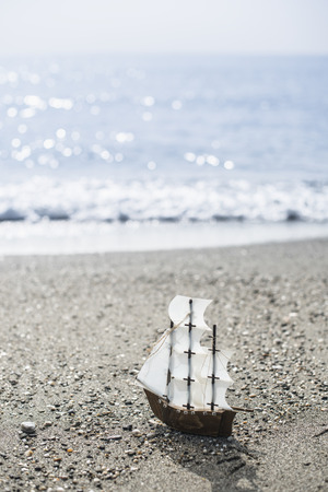 Model sailing ship on the beachの写真素材
