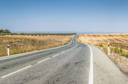 Long asphalt road and blue sky.の写真素材