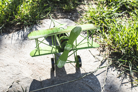 Plane toy in the garden. Sunny dayの写真素材