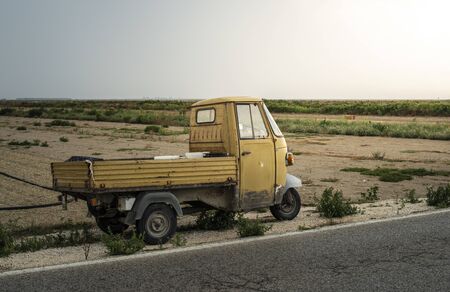 Small apo vintage truck in farm. Sunset の写真素材