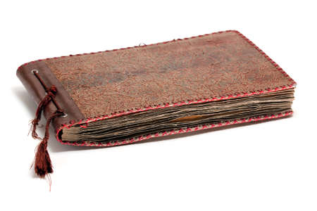 Old photo album isolated on white backgroundの写真素材