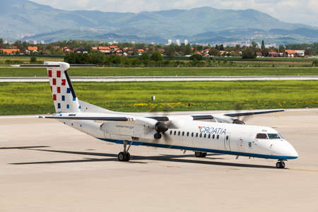 Croatia Airlines Dash-8 on tarmac at Pleso Airport in Zagreb, Croatiaのeditorial素材