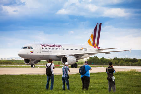 Airplane spotters taking photos of Germanwings Airbus A319-112 after it landed on Pleso Airport in Zagreb, Croatia のeditorial素材