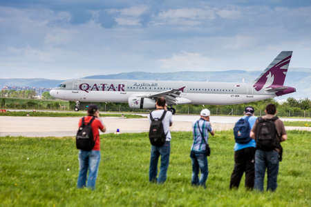 Airplane spotters spotting Russian Airlines Airbus A320-214 taking off from Pleso Airport in Zagreb, Croatia and taking photos of the climbing Aeroflot airliner のeditorial素材