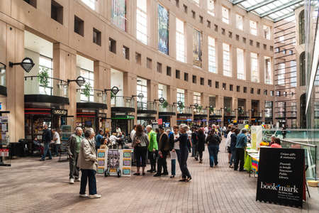 The interior of the Vancouver Public Library. The library is the third largest public library system...