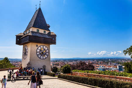 28m tall clock tower (Uhrturm) in Graz, Austria. It was built in 16th century; its handles have...