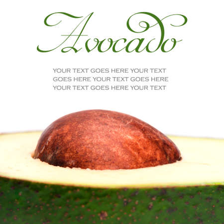 Half of avocado with pit isolated on white background, with text standing in for copy space の写真素材