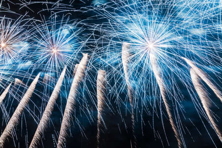Big fireworks streaks in the night skyの写真素材