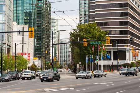 Intersection of West Pender Street and Georgia Street in Vancouver downtown  Georgia St  is one of...