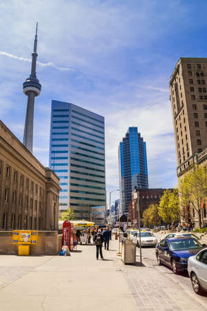 TORONTO - MAY 7: View at buildings in downtown Toronto, with CN Tower on the left. Toronto is financial capital of Canada with five largest financial institutions of Canada situated in offices in the Financial District. のeditorial素材