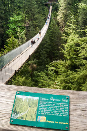 VANCOUVER, CANADA - MAY 23, 2007: Capilano Suspension Bridge over Capilano River in District of North Vancouver, British Columbia, Canada. It is 140 metres long and 70 metres above the river. のeditorial素材