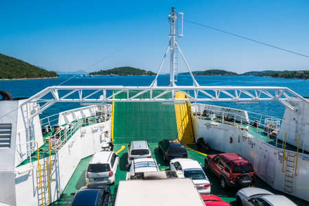 ADRIATIC SEA, CROATIA - AUGUST 13, 2010. Cars on a Jadrolinija company car ferry sailing between Korcula and Peljesac in Adriatic Sea. Jadrolinija is state-owned with main mission in connecting Croatian islands to the mainland by operating passenger and cのeditorial素材