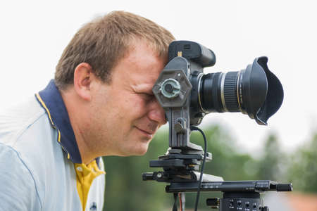 VARAZDIN, CROATIA - MAY 2, 2009  Closeup of tourist photographer taking pictures using panoramic head during Varazdin Spacirfest festival, held every year at the end of summer のeditorial素材