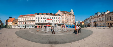 OSIJEK, CROATIA - MAY 9, 2009: People gathering around fountain on the main square of Osijek. Osijek is the largest city in Slavonia, fourth largest city in Croatia and seat of the Osijek-Baranya county.のeditorial素材
