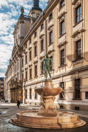 WROCLAW, POLAND - OCTOBER 7, 2009: Statue of Naked Fencer in front of University of Wroclaw. Statue was designed by Hugo Lederer and erected in 1904.のeditorial素材