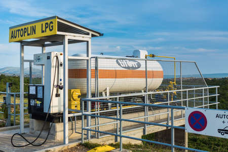 JASENICE, CROATIA - AUGUST 21, 2014: Liquefied petroleum gas tank at Tifon gas station on Zagreb-Split highway. LPG is used to fuel internal combustion engines and is gaining popularity as it's much cheaper than gasoline.のeditorial素材