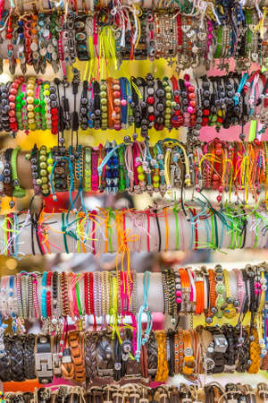 NICE, FRANCE - AUGUST 16, 2015: Handmade jewelry at the street shop in Nice. Nice is 5th most populous city in France and capital of Alpes Maritimes department.のeditorial素材