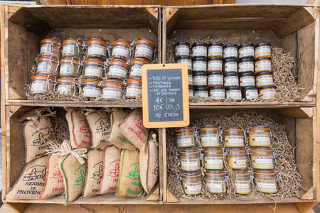 L'ISLE-SUR-LA-SORGUE, FRANCE - AUGUST 14, 2015: Local souvenirs at the Mathilde M. store in L'Isle-sur-la-Sorgue. It is French brand selling handmade deco objects design, patterns and embroidery, paintings, decoration, fragrances and perfumes.のeditorial素材