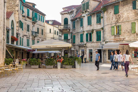 SPLIT, CROATIA - MAY 28, 2015: People around the restaurant on the main square in Split, Croatia. Split is the largest city of Dalmatia and second most largest city in Croatia.のeditorial素材