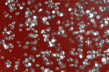 Water Drops On Red Background Texture colorful waterdropの写真素材