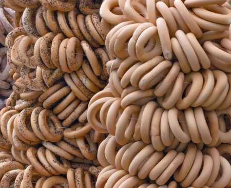 Assorted Bagels on the rope, food background