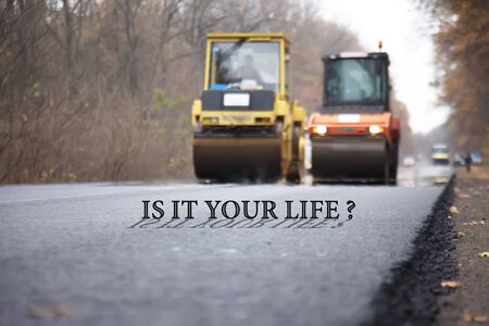 Two road rollers during asphalt compaction worksの写真素材