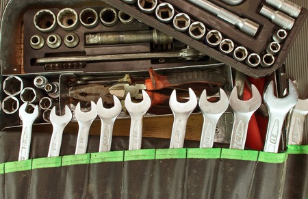 Many dirty set of hand tools on a vintage backgroundの写真素材