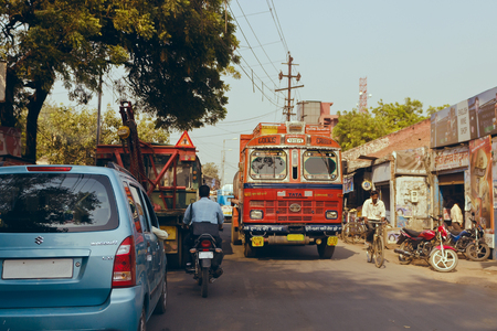 Delhi, India, october 16, 2011: Traffic on the road in India, motorcyclists cyclists pedestrians and carsのeditorial素材