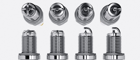 Spare parts spark plugs on white background for car and motorcycle. New auto parts spark plug. 3D...