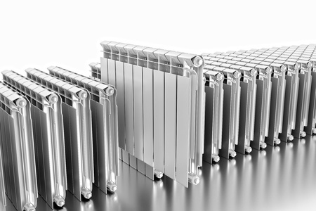 3D rendering. Central heating radiators with many sections. Many white heating radiators on white background. Big choice of water radiators.の写真素材