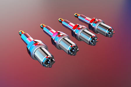 Spare parts spark plugs on multicolored background for car and motorcycle. New auto parts spark...