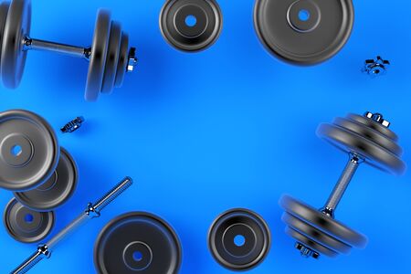 Image of a dumbbell for sports. Bodybuilding equipment on blue backgroundの写真素材