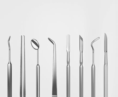 Image of a tooth on a white background with a dentists tools. Dentist set tools for inspect of the teeth. 3D rendering.の写真素材