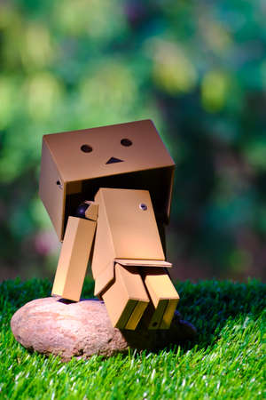 Robot box sitting on a rockのeditorial素材