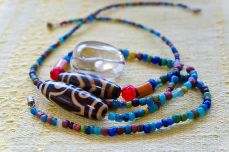 Wooden and magnetic beads necklace detailの写真素材