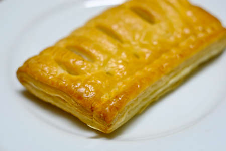 Pineapple pie on a white plate
