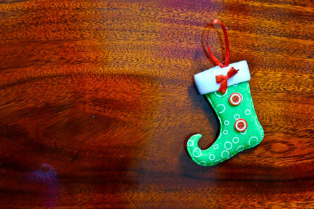 Christmas socks on a background of brown wood.の写真素材