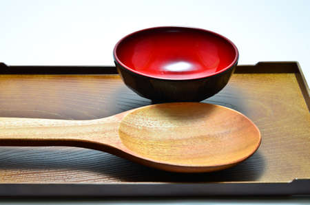 Equipment Dining wooden spoon cup of soup on a wooden tray.の写真素材