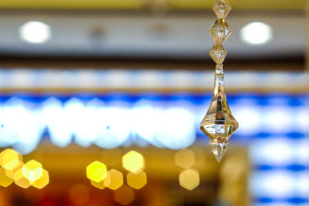 Luxury Crystal Chandelier. Close up on the crystal of a contemporary crystal decoration.の写真素材