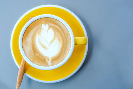 Coffee Hot mocha latte yellow cup on tableの写真素材