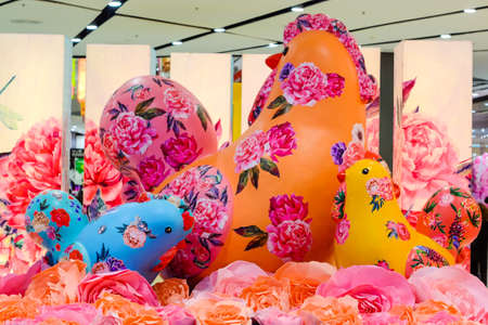 Chicken statue painted with colorful flowers. (Festival Easter)の写真素材