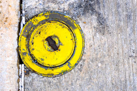 Cap yellow pipe on the concrete.の写真素材
