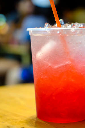 Strawberry soda on wood table background, Summer beverageの写真素材