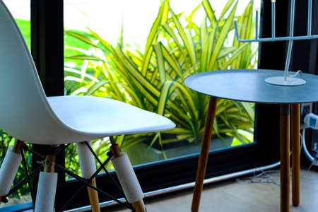 Empty White Interior Cafe Tables in Modern (white chair in cafe)の写真素材