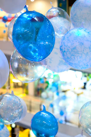 decorative blue balloons at the festival as well. (Background balloons)の写真素材