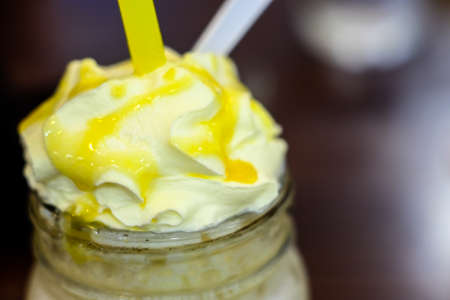 caramel latte frappe in coffee shopの写真素材